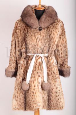 Стильная шубка из оцелота, отделка песец.